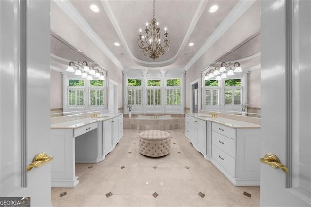 9005 Old Southwick Pass, Alpharetta, GA 30022 - full bath with a chandelier, ornamental molding, two vanities, recessed lighting, and a garden tub