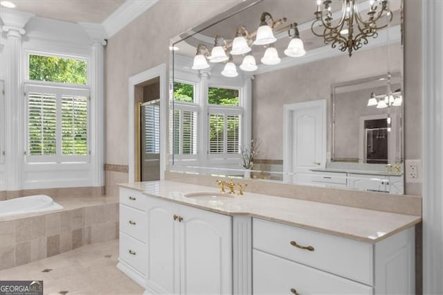 9005 Old Southwick Pass, Alpharetta, GA 30022 - bathroom featuring a chandelier, vanity, ornamental molding, tile patterned flooring, and a relaxing tiled tub
