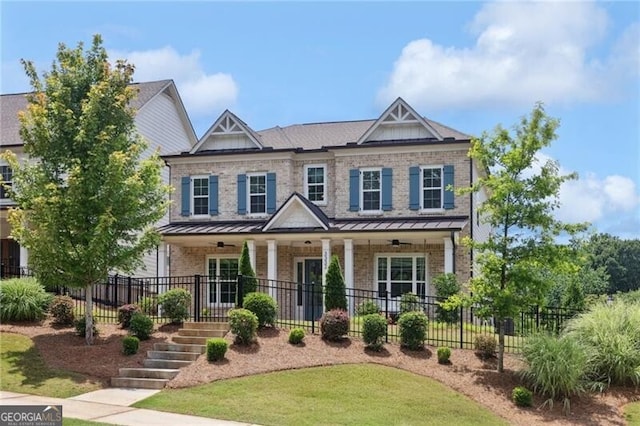 3332 Old Concord Rd SE, Smyrna, GA 30082 - craftsman-style house with a porch, brick siding, a standing seam roof, and stairway