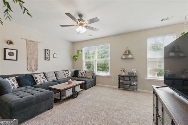 771 Tulip Poplar, Lawrenceville, GA 30044 - living area featuring healthy amount of natural light, light carpet, and a ceiling fan