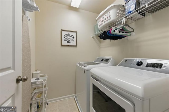 771 Tulip Poplar, Lawrenceville, GA 30044 - washroom featuring independent washer and dryer and light tile patterned floors