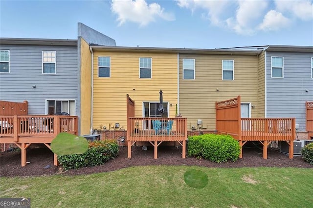 771 Tulip Poplar, Lawrenceville, GA 30044 - rear view of property featuring a wooden deck and a yard