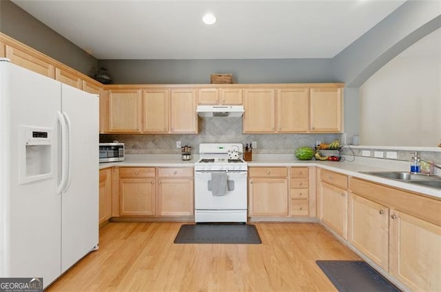 771 Tulip Poplar, Lawrenceville, GA 30044 - kitchen featuring white appliances, light brown cabinetry, under cabinet range hood, light wood-type flooring, and recessed lighting