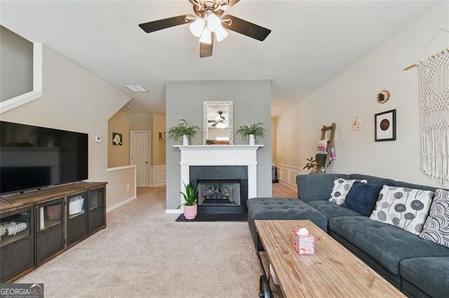 771 Tulip Poplar, Lawrenceville, GA 30044 - living room with ceiling fan, light colored carpet, and a fireplace with flush hearth