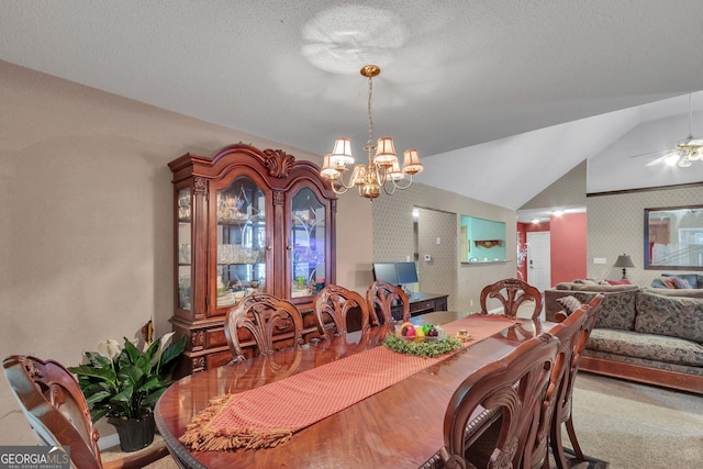 4969 Truitt Ln, Decatur, GA 30035 - dining space with a chandelier, lofted ceiling, wallpapered walls, ceiling fan, and a textured ceiling