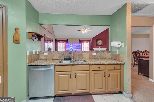 4969 Truitt Ln, Decatur, GA 30035 - kitchen featuring stainless steel dishwasher, a ceiling fan, vaulted ceiling, and a peninsula