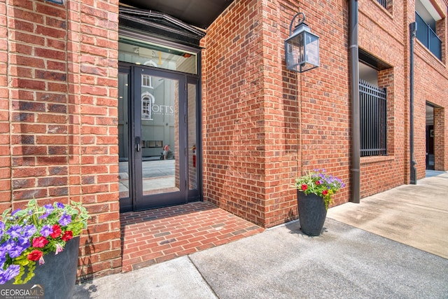 1 E 3rd Ave Unit 401, Rome, GA 30161 - view of exterior entry featuring brick siding
