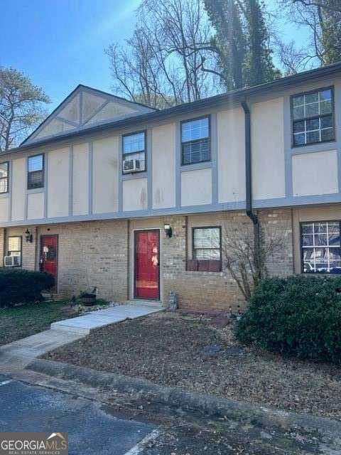 1151 Rankin St Unit 2B, Stone Mountain, GA 30083 - view of front of house with brick siding and stucco siding