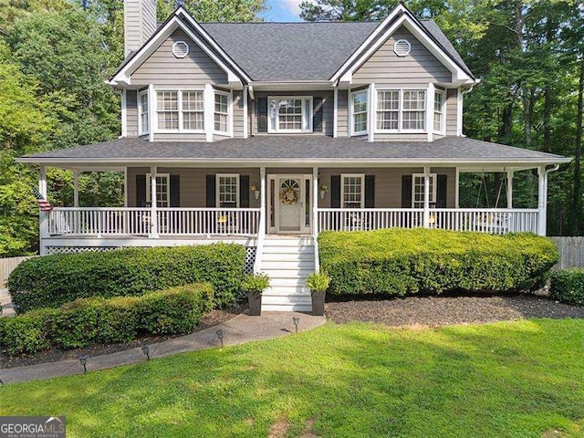 150 Kensley Way, Dallas, GA 30157 - view of front of home featuring covered porch, a front lawn, a chimney, stairway, and roof with shingles