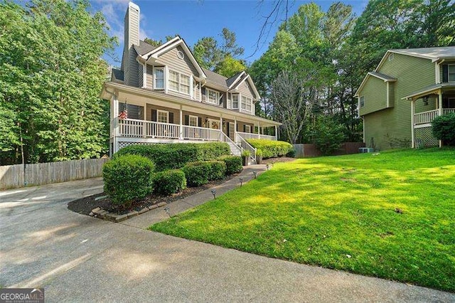 150 Kensley Way, Dallas, GA 30157 - view of front of home with covered porch and a chimney