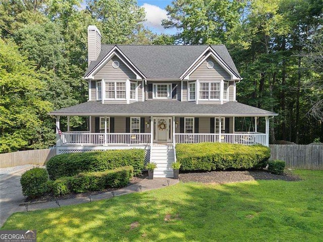 150 Kensley Way, Dallas, GA 30157 - view of front of home with covered porch, a chimney, and stairway