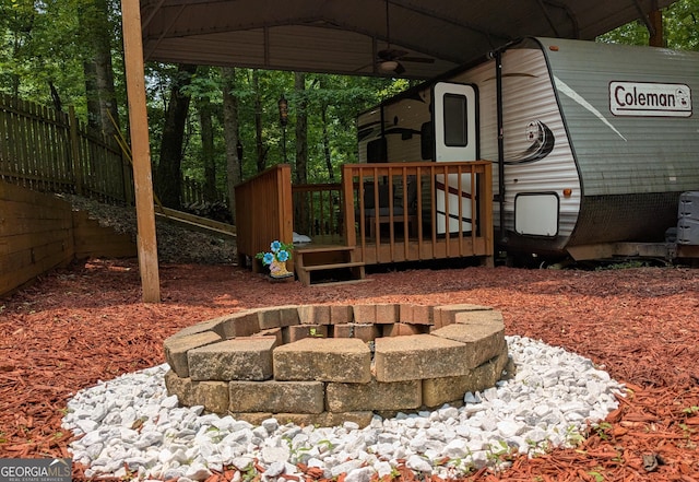 336 6th St, Ellijay, GA 30540 - view of yard featuring a fire pit, a deck, and ceiling fan