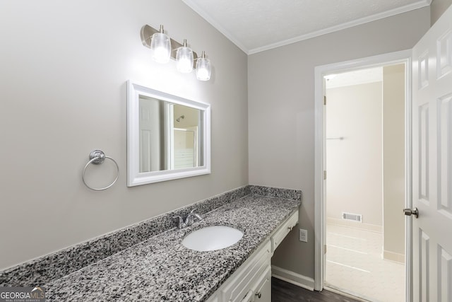11102 Hunters Ln, Hampton, GA 30228 - bathroom featuring vanity, ornamental molding, and wood finished floors