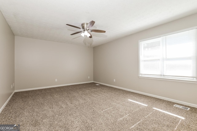 11102 Hunters Ln, Hampton, GA 30228 - carpeted empty room with ceiling fan and baseboards