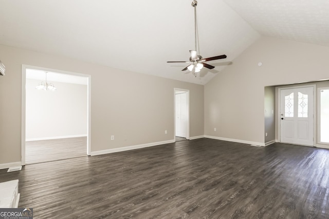 11102 Hunters Ln, Hampton, GA 30228 - unfurnished living room featuring ceiling fan, a chandelier, dark wood finished floors, and high vaulted ceiling