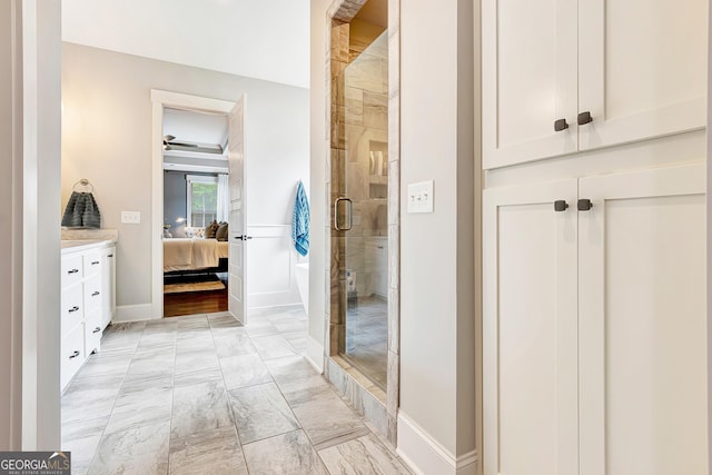 119 Waterview Cir, Newnan, GA 30263 - bathroom with marble finish floors, a stall shower, ensuite bath, baseboards, and vanity