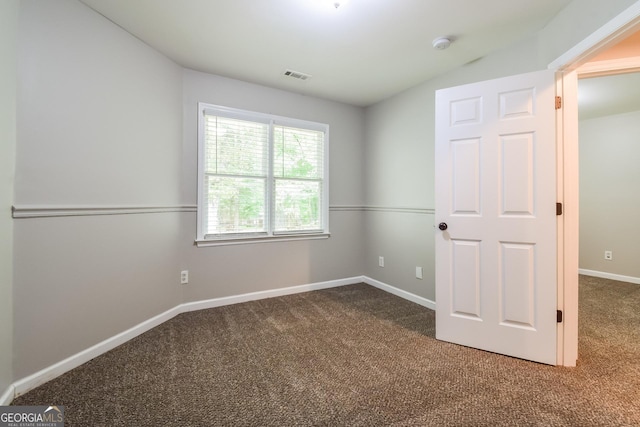 100 Inland Cir, Newnan, GA 30263 - unfurnished bedroom featuring carpet floors and baseboards