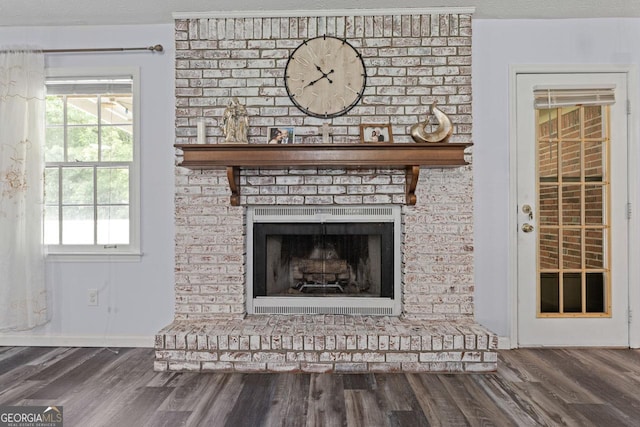 1738 Sherry Ln, Jonesboro, GA 30236 - detailed view of wood finished floors and a fireplace