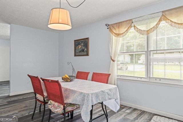 1738 Sherry Ln, Jonesboro, GA 30236 - dining area with wood finished floors and baseboards