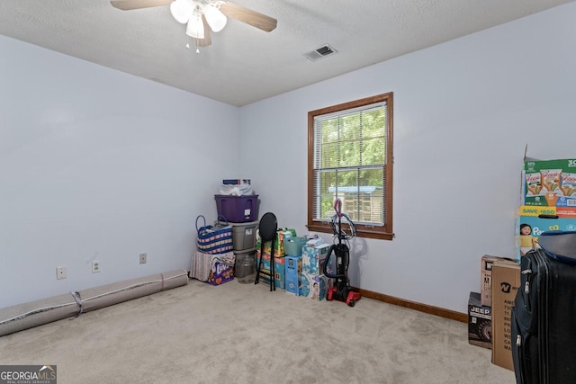 1738 Sherry Ln, Jonesboro, GA 30236 - miscellaneous room featuring carpet and ceiling fan