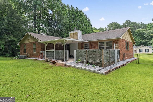 1738 Sherry Ln, Jonesboro, GA 30236 - back of property featuring brick siding and a chimney