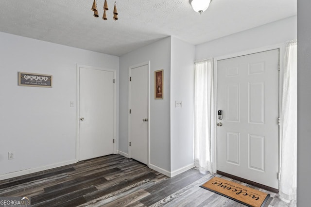 1738 Sherry Ln, Jonesboro, GA 30236 - entrance foyer with wood finished floors and a textured ceiling