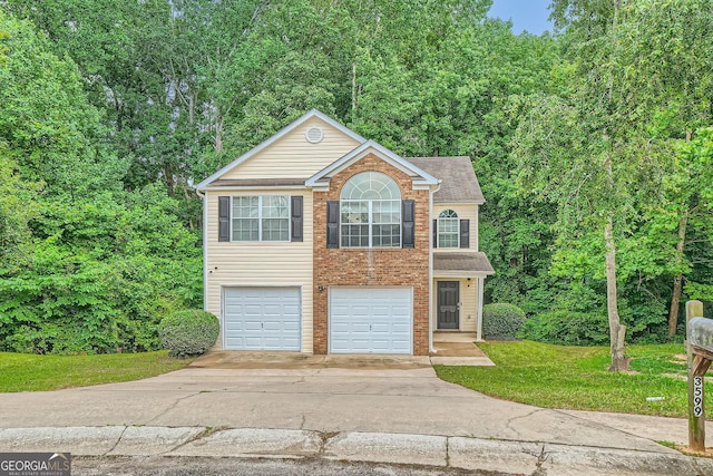 3599 Brookstone Way, Union City, GA 30291 - view of front of property featuring driveway, an attached garage, and a front lawn