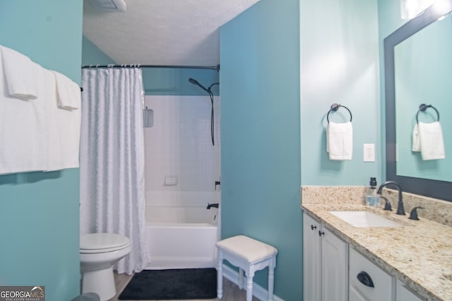 4336 Thorngate Ln, Acworth, GA 30101 - full bathroom with vanity, shower / bathtub combination with curtain, and a textured ceiling