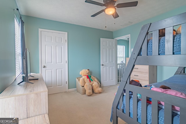 4336 Thorngate Ln, Acworth, GA 30101 - bedroom featuring multiple windows, carpet, and ceiling fan