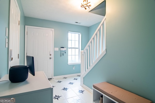 4336 Thorngate Ln, Acworth, GA 30101 - entryway featuring baseboards and stairs
