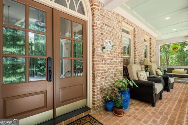771 Rattlesnake Rdg, Dawsonville, GA 30534 - doorway to property featuring a porch, brick siding, and french doors