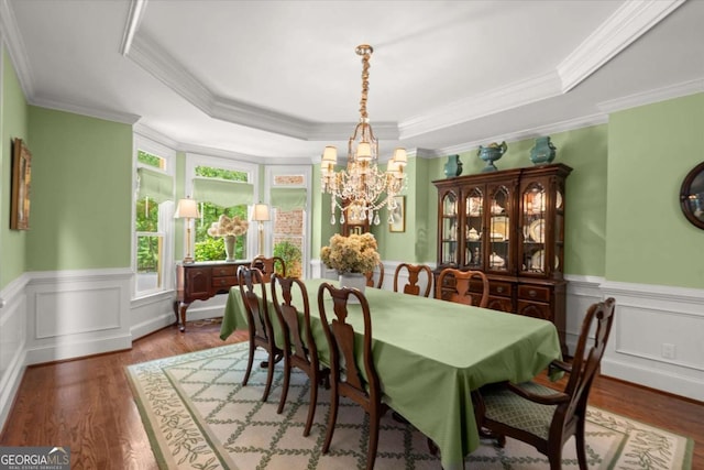 771 Rattlesnake Rdg, Dawsonville, GA 30534 - dining room featuring a chandelier, wood finished floors, a raised ceiling, wainscoting, and ornamental molding