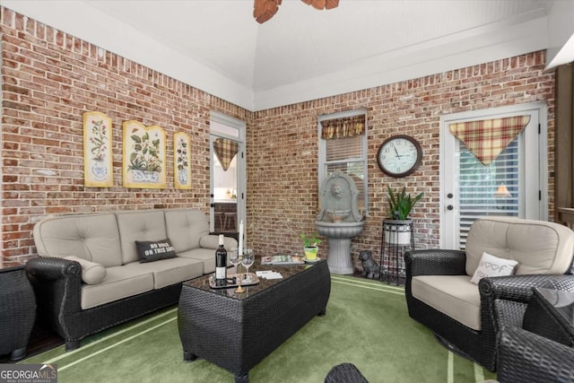 771 Rattlesnake Rdg, Dawsonville, GA 30534 - living room featuring carpet flooring and brick wall