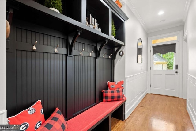 771 Rattlesnake Rdg, Dawsonville, GA 30534 - mudroom with crown molding, wood finished floors, wainscoting, and a decorative wall