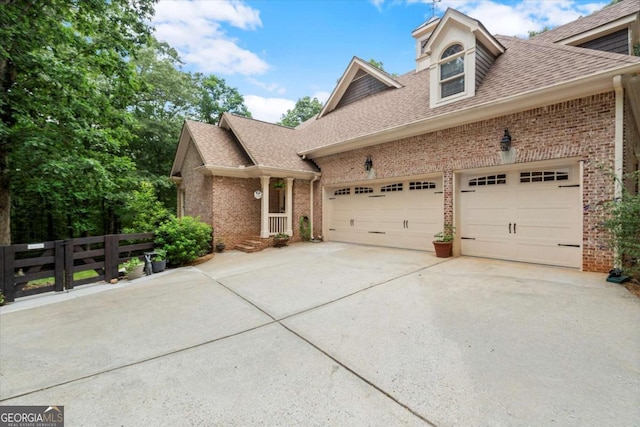 771 Rattlesnake Rdg, Dawsonville, GA 30534 - view of side of property featuring brick siding, driveway, a garage, and a shingled roof