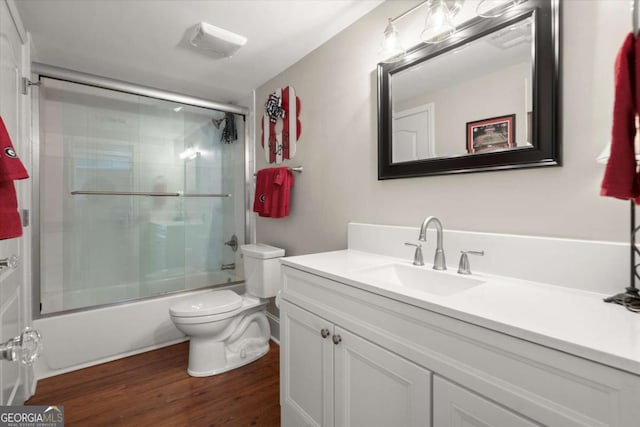 771 Rattlesnake Rdg, Dawsonville, GA 30534 - full bathroom with vanity, wood finished floors, and enclosed tub / shower combo