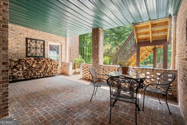 771 Rattlesnake Rdg, Dawsonville, GA 30534 - view of patio / terrace featuring stairs and outdoor dining area