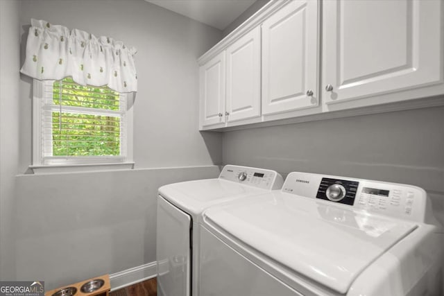 771 Rattlesnake Rdg, Dawsonville, GA 30534 - laundry area featuring separate washer and dryer, cabinet space, and dark wood-style flooring