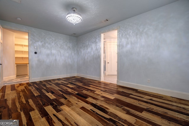 1000 Three Notch Rd, Buckhead, GA 30625 - spare room with hardwood / wood-style flooring, a chandelier, and a smoke detector