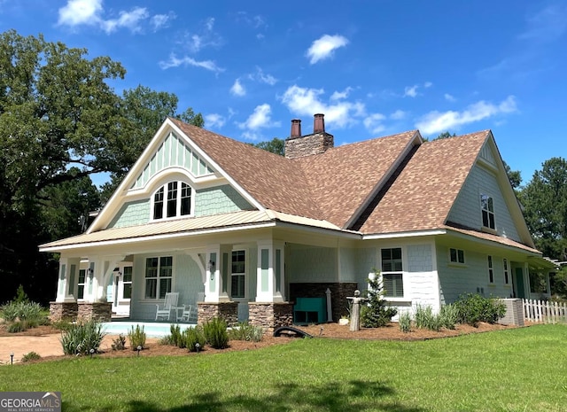 1000 Three Notch Rd, Buckhead, GA 30625 - view of front of home featuring a front yard, a chimney, covered porch, roof with shingles, and stone siding