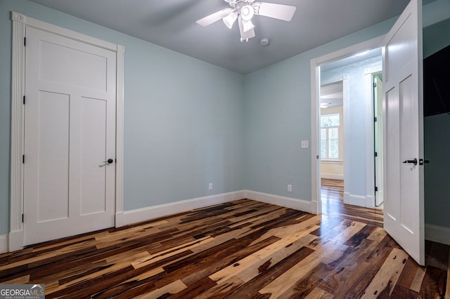 1000 Three Notch Rd, Buckhead, GA 30625 - unfurnished bedroom featuring dark wood-style floors and ceiling fan
