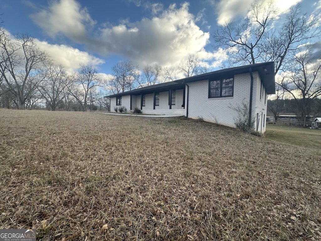 11206 Jefferson Rd, Athens, GA 30607 - back of house with brick siding and a lawn