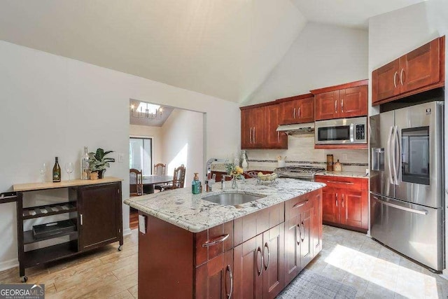 3493 Wood Acres Blvd, Duluth, GA 30096 - kitchen featuring stainless steel appliances, a sink, light stone countertops, tasteful backsplash, and under cabinet range hood