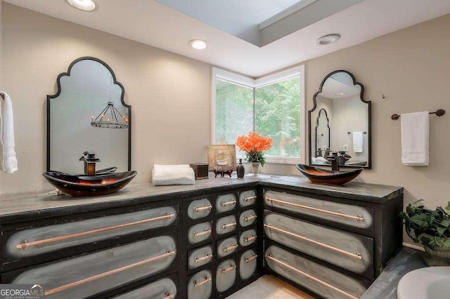 3493 Wood Acres Blvd, Duluth, GA 30096 - bathroom featuring double vanity and recessed lighting