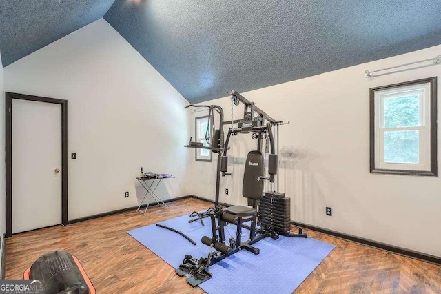 3493 Wood Acres Blvd, Duluth, GA 30096 - exercise area featuring lofted ceiling, a textured ceiling, and baseboards