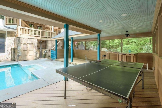 3493 Wood Acres Blvd, Duluth, GA 30096 - wooden terrace featuring a ceiling fan, an outdoor pool, and stairs