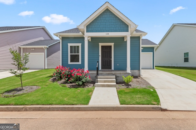 118 Lenox Cir, Lagrange, GA 30241 - view of front facade with an attached garage, driveway, and a front yard