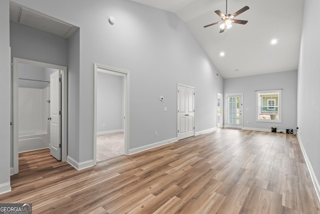 118 Lenox Cir, Lagrange, GA 30241 - unfurnished living room with high vaulted ceiling, a ceiling fan, light wood finished floors, recessed lighting, and attic access