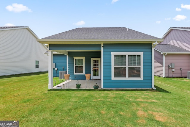 118 Lenox Cir, Lagrange, GA 30241 - rear view of house with a lawn, central AC, a shingled roof, and a patio