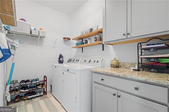 100 Yunsoo Pl E, Big Canoe, GA 30143 - laundry room featuring washer and clothes dryer and cabinet space